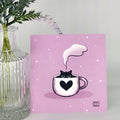 Illustration of a cat in a coffee cup with steam on a pink background, next to a clear vase with greenery.