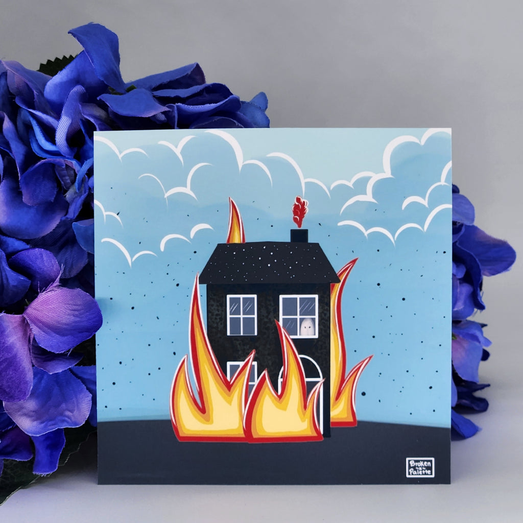 Print with a house on fire illustration surrounded by purple flowers